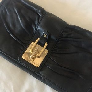 Black leather Michael Kors Clutch